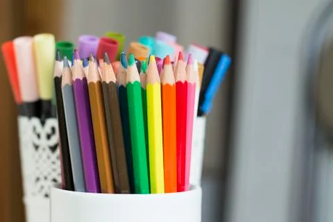 Colorful pencils in a box Stock Photos