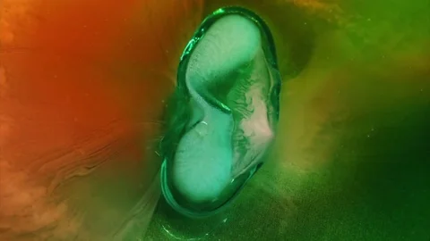 Colorful Pill Dissolving Macro Stock Footage 75657381