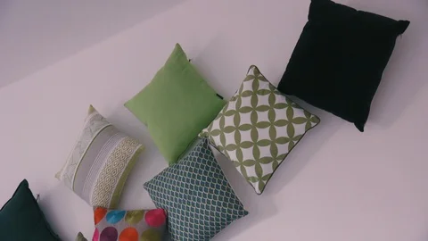 Colorful pillows wall mounted Stock Footage 86171580