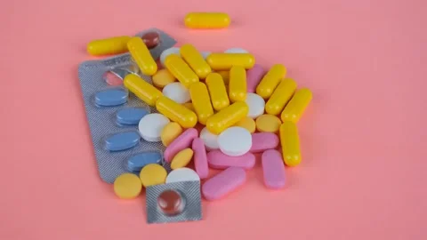 Colorful pills rotate Stock Footage 236101335