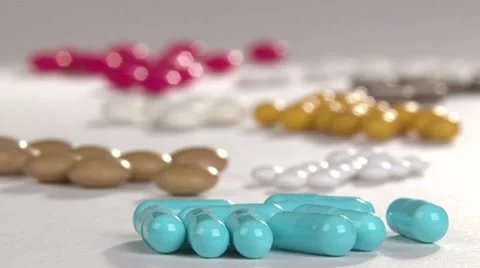 Colorful pills, tablets. Camera dolly,. Stock Footage 7755345