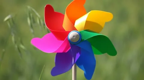 Colorful pinwheel in a field of wheat Stock Footage