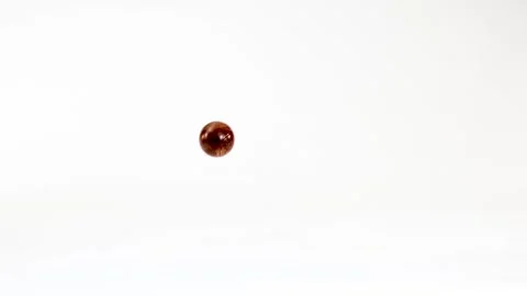 Colorful Planet Marbles Bouncing and Orbiting on a White Background Stock Footage 333604704
