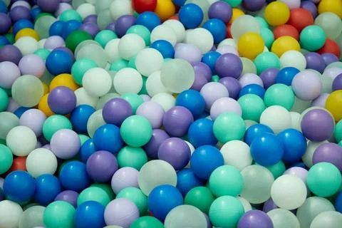 Colorful Plastic Balls Background Texture in Kids Playroom Stock Photos