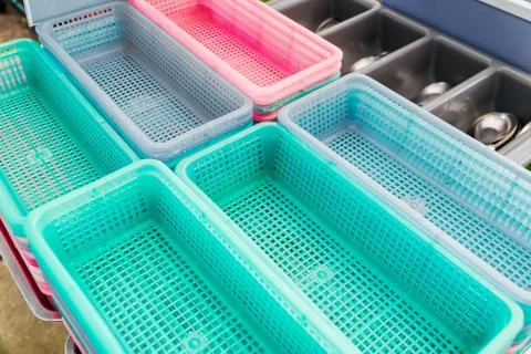 Colorful plastic baskets Stock Photos