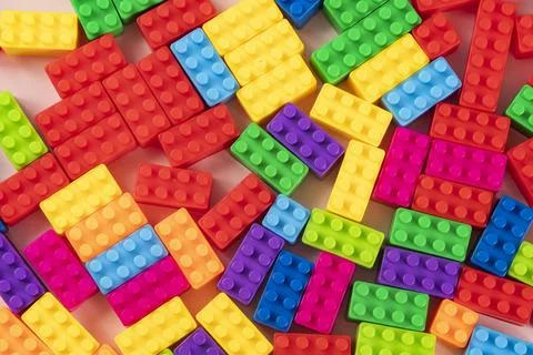 Colorful plastic building block patterns isolated. Toy for children Stock Photos