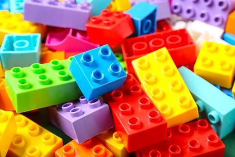 Colorful plastic building blocks as background Stock Photos