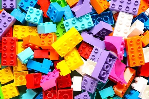 Colorful plastic building blocks as background Stock Photos