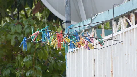 Colorful Plastic Clothespins. Rain Drops. Stock Footage 47018436