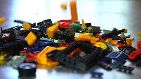 Colorful plastic designer at the table, building kit, slow motion 스톡 동영상 89037601