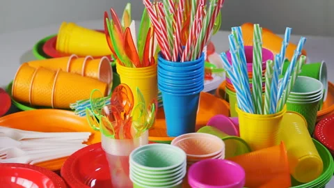 Colorful plastic disposable tableware for picnic on table 動画素材 93877175