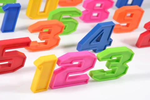 Colorful plastic numbers 123 on white Stock Photos