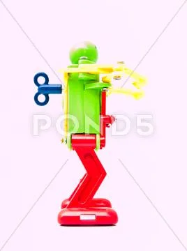 A colorful plastic robot in profile view Stock Photos