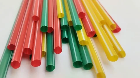 Colorful plastic straws on white background. concept of reducing plastic use Stockbeeldmateriaal 309979093