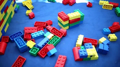 Colorful plastic toy construction blocks. Stock Footage 317748276