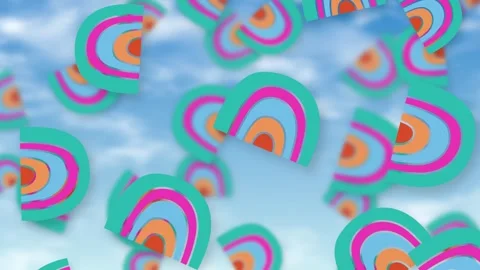 Colorful Playful Abstract Objects Falling Over a Bright Blue Sky Stock Footage 345037780
