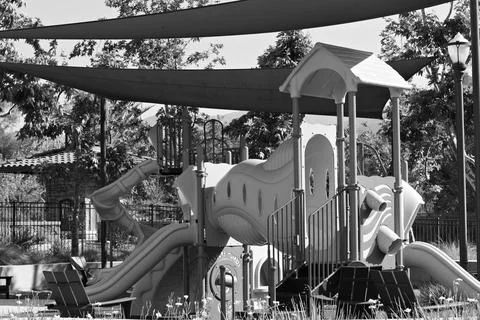 Colorful playground structure with slide Stock Photos