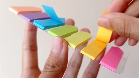 A colorful post-it with white background Stock Footage 145462265