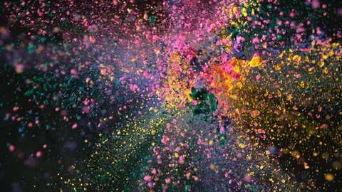 Colorful powder exploding on black background in super slow motion, shot with Stock Footage 101034697