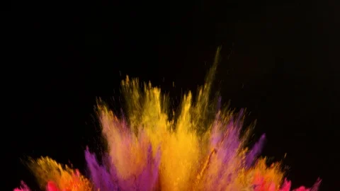 Colorful powder exploding on black background in super slow motion. Stock Footage