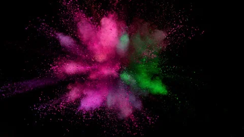Colorful powder exploding on black background in super slow motion. Stock Footage 129236925