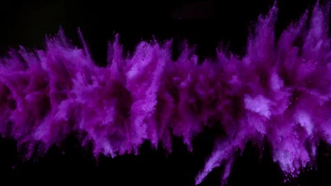 Colorful powder exploding on black background in super slow motion. Stock Footage 129913728