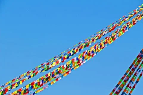 Colorful prayer flag, a rectangular cloth found mostly in Tibet and Nepal Stock Photos