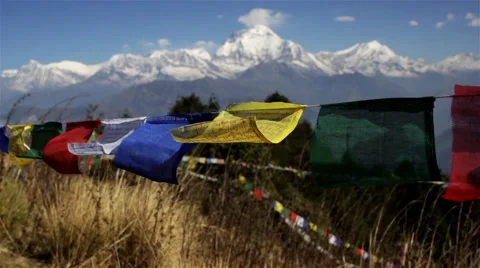 Colorful praying flags flutter in wind in Himalayan mountains Stock Footage 67646111