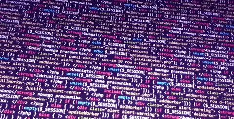 Colorful programming php and html code on a monitor. PHP language code closeu Stockfoto's