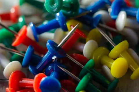 Colorful pushpins Stock Photos
