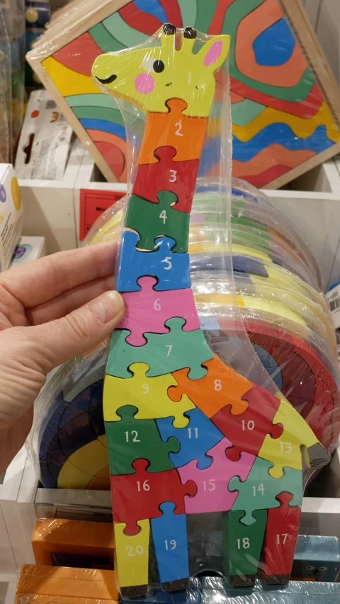 Colorful puzzle board game. Development of skills and motor skills in children w Stock Footage 304033504