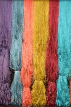 Colorful of raw multicolor silk thread background Stock Photos