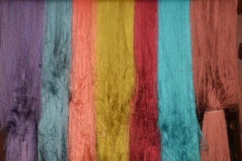Colorful of raw multicolor silk thread background Stock Photos