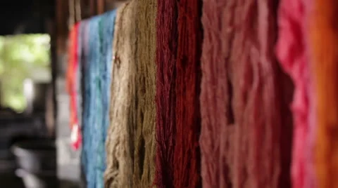 Colorful of raw silk thread on a rail. Stock Footage 60602235