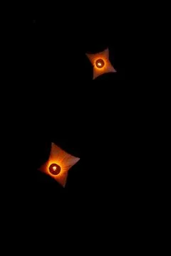 Colorful Rectangle paper floating lanterns are flying to dark night skies in  Stock Photos