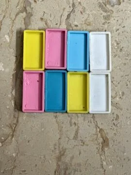 Colorful Rectangular Plastic Blocks Arranged in a Grid Pattern Stock Photos