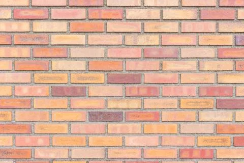 Colorful red and brown brick wall Stock Photos