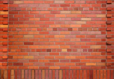 Colorful red brick wall Stock Photos