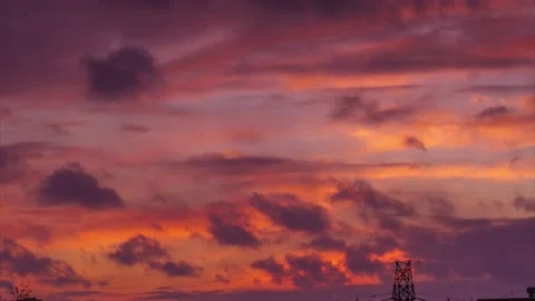 Colorful red clouds in sunset sky background. Timelapse Stock Footage 153470140