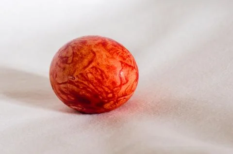 Colorful red easter egg isolated on white background. Stock Photos