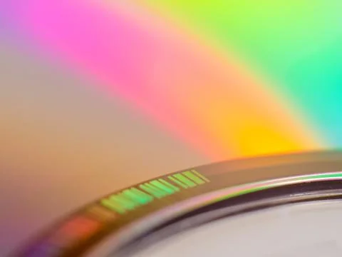 Colorful reflection on a compact disc Stock Photos