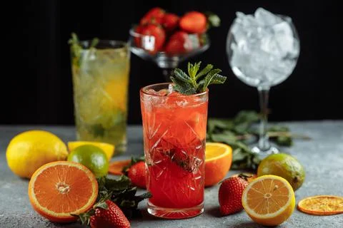 Colorful refreshing drinks for summer, cold strawberry lemonade juice with ice 스톡 사진