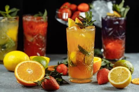 Colorful refreshing drinks for summer, cold strawberry lemonade juice with ice 스톡 사진