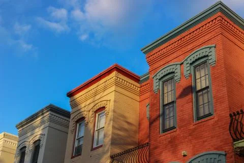 Colorful residential buildings against blue sky, Washington DC, USA Stock Photos