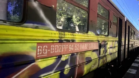Colorful Retro Train. Old Train At The Station. Brightly Colored Retro Train. Stock Footage 149318942