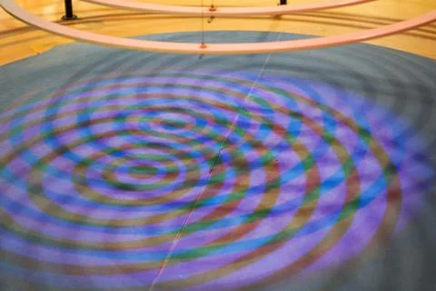Colorful ring light projected onto the ground by colorful ring lights Fotos de archivo