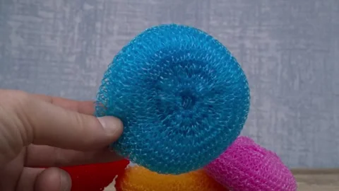 This is a Colorful Round Scrubber, designed for effective cleaning and bathing Stock Footage 290226771