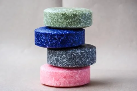 Colorful round solid shampoo bars, zero waste Stock Photos