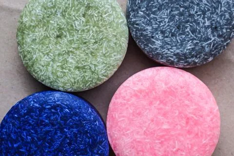 Colorful round solid shampoo bars, zero waste Stock Photos