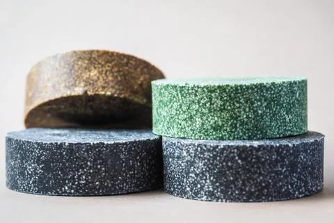 Colorful round solid shampoo bars, zero waste Stock Photos